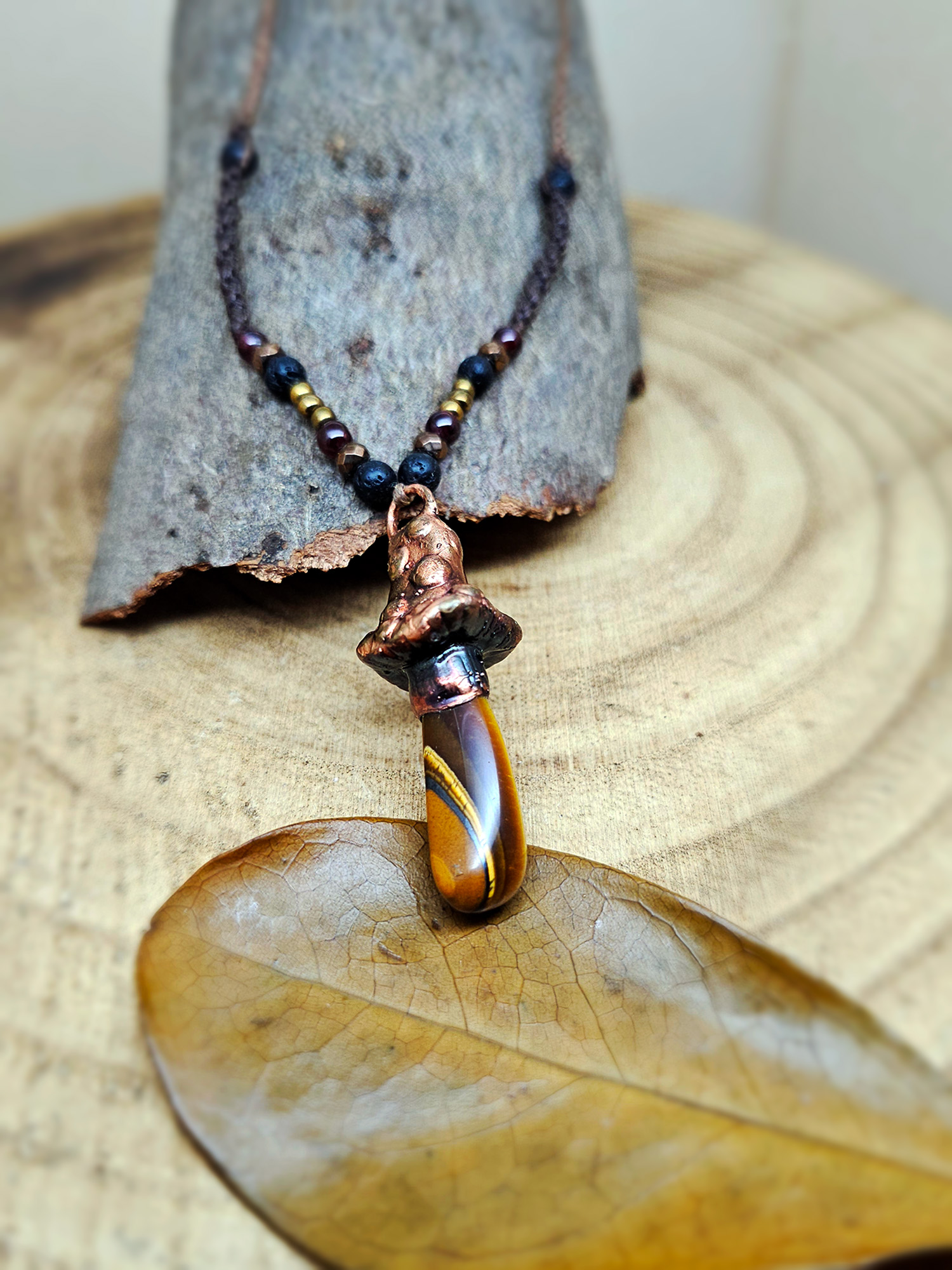 Naszyjnik miedziany - grzybek z tygrysim okiem